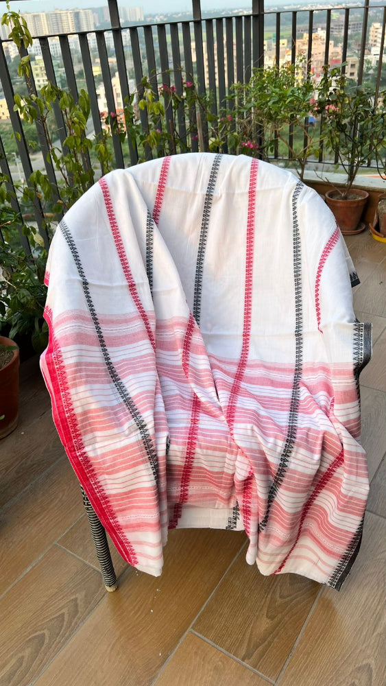 White saree with pink stripes