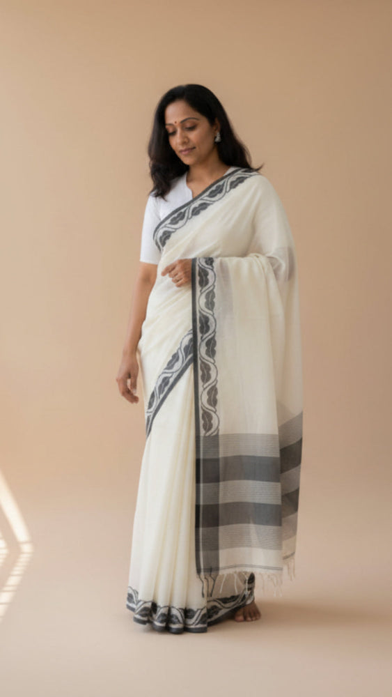 Beige Handloom cotton saree with Black woven border