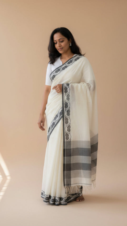 Beige Handloom cotton saree with Black woven border